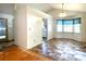 Open-concept living area with sightlines to the kitchen and breakfast nook at 53 Villa Rosa Way, Temple, GA 30179