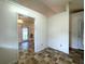 A room featuring linoleum flooring, a closet door, and a window at 53 Villa Rosa Way, Temple, GA 30179