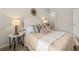 Bedroom featuring a side table with gold lamp at 9452 Pinecrest Path # 314, Jonesboro, GA 30238