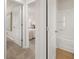 Hallway featuring doors into a bedroom and bathroom at 9452 Pinecrest Path # 314, Jonesboro, GA 30238