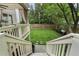 Landscaped backyard with deck access, ideal for outdoor living and entertaining at 1165 Victoria Ne St, Brookhaven, GA 30319