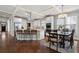 Bright, open kitchen with a center island, stainless steel appliances, and hardwood floors at 1165 Victoria Ne St, Brookhaven, GA 30319