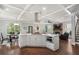 Spacious kitchen island with white cabinets and stainless steel appliances in an open-concept layout at 1165 Victoria Ne St, Brookhaven, GA 30319