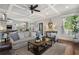 Stylish living room open to kitchen, offering modern comfort and design details at 1165 Victoria Ne St, Brookhaven, GA 30319