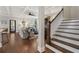 Bright living room boasts hardwood floors, a coffered ceiling, and plentiful natural light at 1165 Victoria Ne St, Brookhaven, GA 30319
