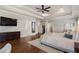 Large main bedroom with a tray ceiling, walk-in closet, and entry to bathroom at 1165 Victoria Ne St, Brookhaven, GA 30319