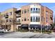 Exterior street view of mixed use building with restaurants, storefronts and dining at 1165 Victoria Ne St, Brookhaven, GA 30319