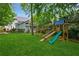 This backyard features a playset with slide and swing for the  at 1349 Middlesex Ne Ave, Atlanta, GA 30306