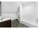 This bathroom features a sink, toilet, and shower with tile surround at 1349 Middlesex Ne Ave, Atlanta, GA 30306