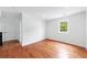 Spacious bedroom featuring wood floors, ample natural light, and clean, white walls at 1349 Middlesex Ne Ave, Atlanta, GA 30306