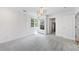 Bedroom featuring gray carpet and two windows for natural light at 1349 Middlesex Ne Ave, Atlanta, GA 30306
