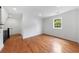 Bright bedroom featuring hardwood floors, natural light, closet and doorway at 1349 Middlesex Ne Ave, Atlanta, GA 30306