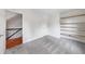 A clean bedroom featuring gray carpet and built-in shelves at 1349 Middlesex Ne Ave, Atlanta, GA 30306