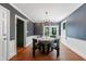Dining room featuring hardwood floors, modern lighting, and neutral walls at 1349 Middlesex Ne Ave, Atlanta, GA 30306