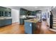 Modern kitchen with stainless steel appliances and an oversized island at 1349 Middlesex Ne Ave, Atlanta, GA 30306