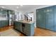 Kitchen with stainless steel appliances, wine cooler and oversized kitchen island at 1349 Middlesex Ne Ave, Atlanta, GA 30306