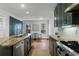 Spacious kitchen with granite counters and stainless steel appliances at 1349 Middlesex Ne Ave, Atlanta, GA 30306