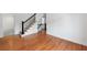 Bright living room with hardwood floors and staircase at 1349 Middlesex Ne Ave, Atlanta, GA 30306