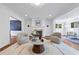 Bright and spacious living room featuring hardwood floors, recessed lighting, and an open layout at 1349 Middlesex Ne Ave, Atlanta, GA 30306