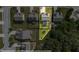 Aerial perspective of property and neighborhood, highlighting backyard with pool and trampoline, and adjacent tree line at 2267 Clapton Ct, Jonesboro, GA 30236