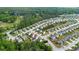 Expansive aerial view of a neighborhood featuring well-maintained homes and lush green spaces in a Gathering-friendly community at 2267 Clapton Ct, Jonesboro, GA 30236