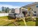 Large backyard featuring a playset, swing set, and above-ground pool at 2267 Clapton Ct, Jonesboro, GA 30236