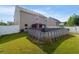 Backyard featuring an above ground pool and a covered patio at 2267 Clapton Ct, Jonesboro, GA 30236