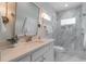 Elegant bathroom featuring a marble walk-in shower and stylish vanity at 2406 Glenwood Ne Dr, Atlanta, GA 30305