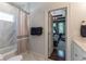 Bathroom featuring a shower-tub combo at 2406 Glenwood Ne Dr, Atlanta, GA 30305