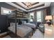 A cozy bedroom with a bunk bed and striped decor at 2406 Glenwood Ne Dr, Atlanta, GA 30305