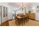 Bright dining room featuring wood table, chandelier and decorative accents at 2406 Glenwood Ne Dr, Atlanta, GA 30305