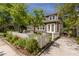 Charming home features a white picket fence and well-manicured front yard at 2406 Glenwood Ne Dr, Atlanta, GA 30305