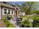 Beautiful home with a well-manicured lawn and an inviting stone patio at 2406 Glenwood Ne Dr, Atlanta, GA 30305