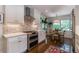 Bright kitchen with stainless appliances, double oven, and breakfast nook at 2406 Glenwood Ne Dr, Atlanta, GA 30305