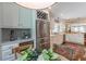 Gourmet kitchen features stainless appliances, wine rack, and ample counter space at 2406 Glenwood Ne Dr, Atlanta, GA 30305