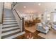 Inviting living room with staircase, hardwood floors, and stylish furniture at 2406 Glenwood Ne Dr, Atlanta, GA 30305