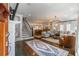 Open concept living room flows into dining with staircase and hardwood floors at 2406 Glenwood Ne Dr, Atlanta, GA 30305