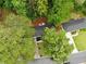 Aerial view of a home surrounded by lush trees and greenery, showcasing its private setting at 4396 Greenleaf Cir, Atlanta, GA 30331