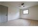 Simple bedroom with light wood floors and modern ceiling fan at 4396 Greenleaf Cir, Atlanta, GA 30331