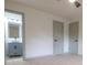 Bedroom showcasing a bathroom entrance and two doors, offering convenience and privacy at 4396 Greenleaf Cir, Atlanta, GA 30331