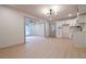 Bright space showing living room and kitchen with modern light fixture at 4396 Greenleaf Cir, Atlanta, GA 30331