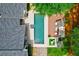 Aerial view showcases a private backyard oasis with a sparkling pool, deck, and lush landscaping at 5785 Timberlane Ter, Sandy Springs, GA 30328