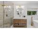 Modern bathroom with glass shower, double vanity, and a luxurious soaking tub at 5785 Timberlane Ter, Sandy Springs, GA 30328