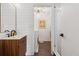 Stylish bathroom with modern vanity, shiplap walls, and a glass-enclosed shower at 5785 Timberlane Ter, Sandy Springs, GA 30328