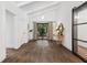 Bright entryway with wood floors, a vaulted ceiling, and stylish décor elements at 5785 Timberlane Ter, Sandy Springs, GA 30328