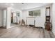Home gym features natural light, mirrors, and equipment, offering a dedicated space for fitness and wellness at 5785 Timberlane Ter, Sandy Springs, GA 30328