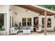 Cozy outdoor patio with comfortable seating, stylish decor, and a relaxed ambiance for gatherings at 5785 Timberlane Ter, Sandy Springs, GA 30328