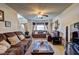 Spacious living room with comfortable seating and lots of natural light at 1506 Saint George Pl, Conyers, GA 30012