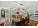 Open dining area featuring a view into the kitchen and an adjacent living room at 4124 Dunnington Dr, Marietta, GA 30062