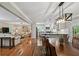 Open floor plan featuring a kitchen with stainless steel appliances, and living room area with hardwood floors at 4124 Dunnington Dr, Marietta, GA 30062